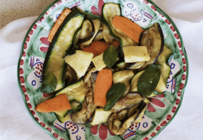 Grilled vegetables with scamorza and mint leaves