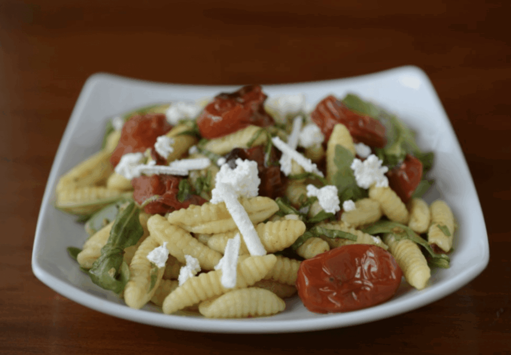 Homemade Cavatelli With Roasted Grape Tomatoes and Arugula