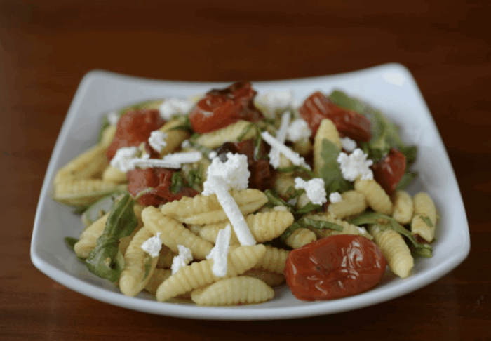 Homemade Cavatelli With Roasted Grape Tomatoes and Arugula