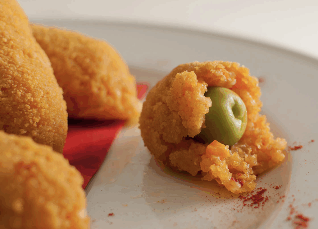 Arancini di riso alle olive e zafferano