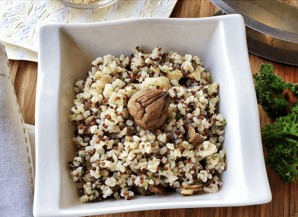Bulgur e quinoa con castagne e nocciole