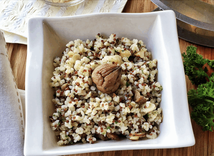 Bulgur e quinoa con castagne e nocciole