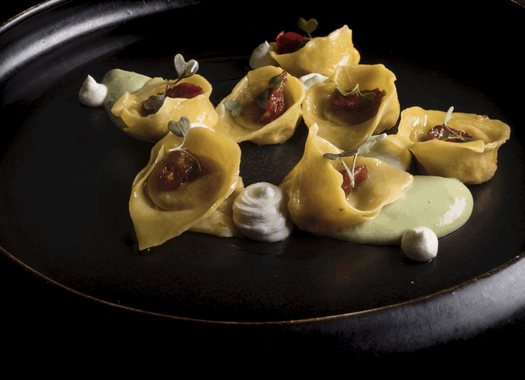 Ravioli di pappa al pomodoro, crema al basilico, burrata